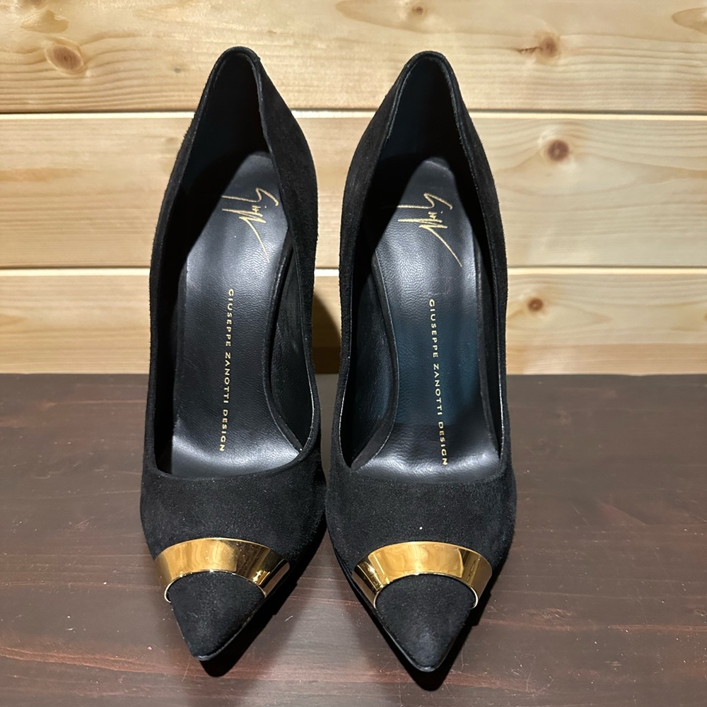 BNWOT Giuseppe Zanotti black suede pumps with gold metal accent.